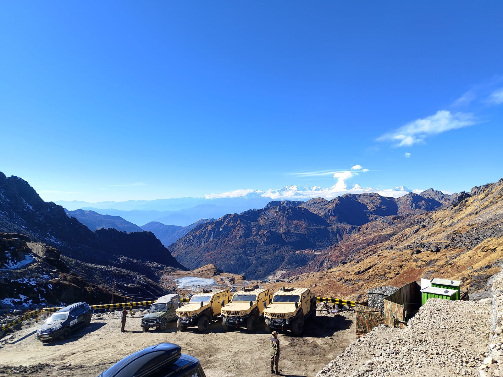 Vintage Land Rovers near Natu La